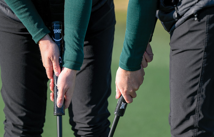  /></p>
<p>In this grip, the lead hand (left hand for right-handed golfers) is placed lower on the grip than the trailing hand. This method is increasingly popular among players of all skill levels.</p>
<p><b>Key Features</b></p>
<p>Promotes a square clubface at impact.</p>
<p>Reduces wrist movement for greater stability.</p>
<p>Who Should Use It: Golfers who struggle with consistency in their stroke or tend to push or pull putts.</p>
<p><strong>Choosing the Right Grip</strong></p>
<p>Selecting a putting grip is a highly personal decision. Factors such as hand size, putting style and stroke mechanics all play a role in determining the ideal grip. It’s essential to experiment with different options and practice to find one that feels natural and improves your performance on the greens.</p>
<p>The putting grip is not just a technical choice; it’s a matter of personal comfort and confidence. Whether you’re a weekend golfer or a Tour professional, refining your grip can lead to more consistent putts and lower scores. Remember, the best putting grip is the one that allows you to trust your stroke under pressure.</p>
<p><strong>The Tiger Woods Putting Gate Drill</strong></p>
<p>The putting gate drill is a simple, yet highly effective, practice technique used by Tiger Woods to develop precise control over his putting stroke and improve his accuracy.<span class=